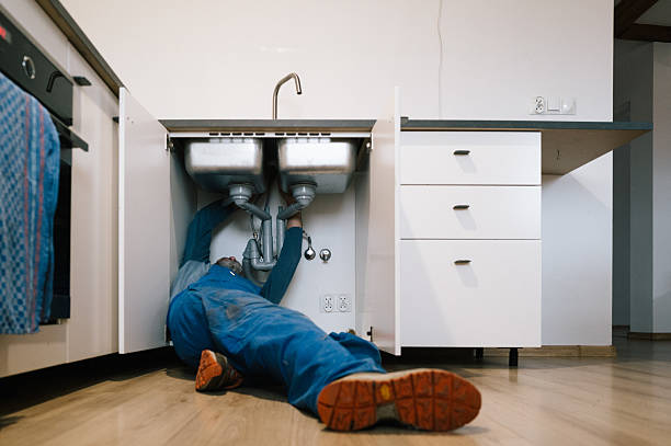 Professional Drain Cleaning technician working in Potterville, MI